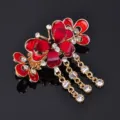Elegant butterfly hair claw clip with rhinestone tassels and red enamel design for women. - Red