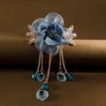 Blue fabric flower hair clip with elegant hanging tassels for vintage retro hairstyles. - Blue