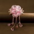 Pink floral hair clip with delicate tassel chains and crystal beads for elegant vintage hairstyles. - Pink