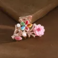 Elegant crystal floral hair claw clip, small metallic hair accessory for women styling. - Colorful
