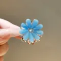 Blue flower hair claw clip with sparkling rhinestones and alloy base for women daily hair styling. - Light Blue