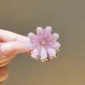 Purple flower hair claw clip with rhinestone and glitter finish, medium size alloy hair accessory. - Light Purple