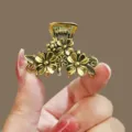 Vintage gold metal hair claw clip with floral relief design, compact size for women. - YZA39-2 / Antique Gold