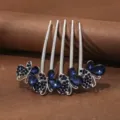 Peineta de estrás plateada, accesorio de mariposa de cristal azul para recogidos elegantes. - Mariposa Azul Súper Brillante