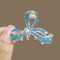 Blue rhinestone bow hair claw clip, elegant metal shark clip for thick hair styling. - Blue