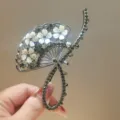 Elegant fan-shaped hair claw clip with sparkling rhinestones and white floral details. - Floral Fan-shaped Style (YZAP33-15) / Gunmetal