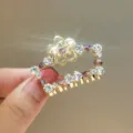 Elegant gold metal rhinestone hair claw clip with purple crystal flowers for women. - CHY55
