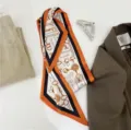Elegant long silk scarf with horsebit chain print and orange border for women accessory. - Orange Border