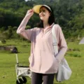 Giacca da sole per donna in rosa chiaro, protezione UPF50+ UV leggera con cappuccio. - Rosa