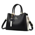 Borsa da donna in patchwork bianco e nero con manici superiori e tracolla rimovibile. - Nero