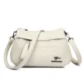 Borsa a tracolla da donna bianca in morbida ecopelle con motivo coccodrillo chic - Bianco avorio
