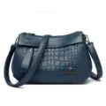 Women's blue soft leather shoulder bag with crocodile pattern and adjustable strap for daily use. - Blue
