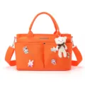 Orange large capacity mommy bag portable baby storage handbag with cute bear pendant and pockets. - Orange + Pendant Badge