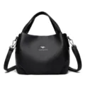 Borsa a mano morbida in pelle nera da donna, grande borsa a tracolla, stile da lavoro. - Nero