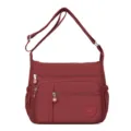 Borsa a tracolla in nylon rosso con tasche multiple, pratica per uso quotidiano. - Rosso