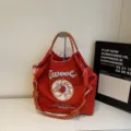 Borsa tote in nylon rosso con ricamo donut, borsa a tracolla casual e pratica borsa per la spesa. - Rosso