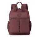 Zaino in nylon bordeaux con tasche multiple, grande capacità per viaggi e uso quotidiano. - Rosso