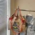 Large capacity cartoon tote bag for women, trendy Japanese style embroidered casual shoulder handbag. - Khaki