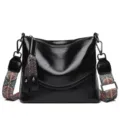 Borsa a tracolla in pelle nera da donna con ampia tracolla etnica e nappina - Nero
