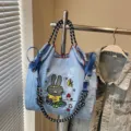 Blue canvas tote bag with cute embroidered rabbit graphic, casual shoulder handbag for women. - Light Blue