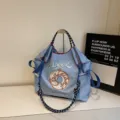 Blue embroidered nylon tote bag, sweet donut pattern shoulder bag, casual everyday handbag. - Light Blue