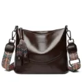 Borsa a tracolla in pelle retrò da donna con spallina larga, elegante borsa a secchiello marrone. - Caffè