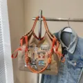 Large capacity embroidered canvas tote bag with stylish Paris theme design and orange straps. - Khaki