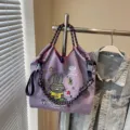 Large capacity canvas tote bag with cute embroidered cartoon rabbit design and rope handles. - Purple
