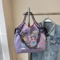 Casual purple embroidered canvas tote bag with Paris landmarks and comfortable rope handles for women. - Purple