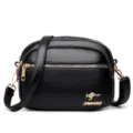 Borsa a tracolla da donna in pelle nera con cerniere multiple, borsa morbida ed elegante. - Nero