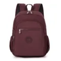 Zaino casual in nylon bordeaux con tasche multiple, leggero e ideale per la scuola o viaggi. - Rosso scuro