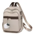 Zaino donna beige elegante con tasca marrone e grazioso pompon soffice vista principale - 32x11x25cm / Kaki