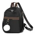Elegante zaino da donna in nylon nero con dettagli marroni e morbido pompon bianco. - 32x11x25cm / Nero