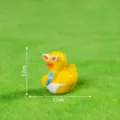Cute miniature yellow duck resin figurine with sunglasses, perfect for DIY crafts and decor. - Glossy Solid Color - Surfing Duck