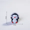 Mini resin penguin figurine with headphones, cute DIY craft ornament for desktop and car decor. - Glossy Music Penguin