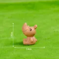 Mini resin rhino figurine, cute desktop ornament and DIY craft accessory, 1.9x1.4cm. - Coffee