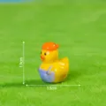 Mini resin yellow duck figurine with hat and overalls, cute desktop car decoration accessory. - Glossy Solid Color - Overalls Duck