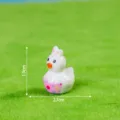 Mini resin yellow duck figurine with bunny ears and polka dots, cute desktop decoration. - Glossy Solid Color - Easter Egg Duck