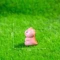 Mini statuetta dinosauro rosa in resina bambola cartone animato carina per bricolage 1.7cm - Tirannosauro Rosa Lucido
