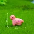 Mini statuetta dinosauro in resina rosa con stampa farfalla, perfetto accessorio fai da te. - Rosa Lucido