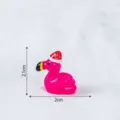 Mini resin flamingo figurine wearing cute Santa hat, pink miniature animal decor variant size 2cm. - Glossy Christmas Hat