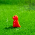 Mini resin dinosaur figurine, orange cute cartoon animal charm ornament for DIY crafts. - Glossy Red Tyrannosaurus