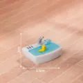 Mini vasca da bagno in resina con simpatica paperella gialla, ideale per decorare la scrivania. - Lavandino