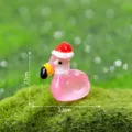 Statuetta fenicottero rosa in resina con cappello di Natale per decorazione giardino. - Lucido Luminoso - Cappello di Natale