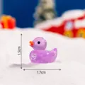 Mini resin Christmas duck figurine with snowflake pattern, micro landscape DIY ornament. - Luminous Glossy Purple