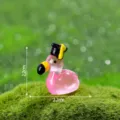 Mini luminous flamingo figurine with graduation cap, perfect for micro landscape garden decor. - Glossy Luminous - Graduation Cap