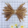 Detailansicht der goldenen Strass Meteor Schleife DIY Bastelzubehör, glitzernde Kristallsteine. - Gold