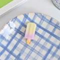Detailed view of a colorful gradient ice cream hair clip, sweet styling hair accessory. - Light Yellow Ice Cream Hair Clip