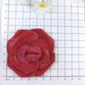 Detailed view of a sparkly 3D rhinestone red rose flower charm, perfect for shoes or bags decor. - Red