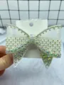 White mesh bow hair clip with shimmering iridescent rhinestones, elegant multi-layer hair accessory. - White Bow